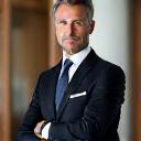 Portrait of a discerning gentleman, luxury car acquisition specialist.